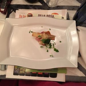 A white plate with some food on it