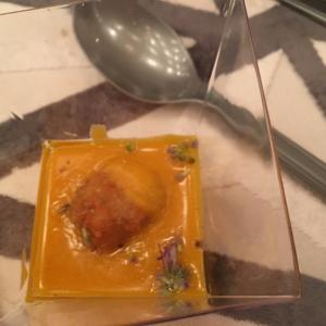 A square plate with some food on it