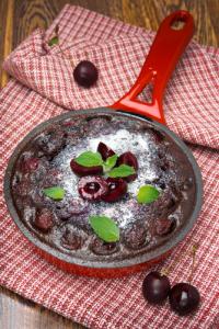 A red pan with some food in it