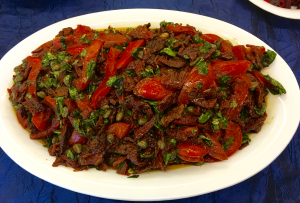 A plate of food that is on the table.