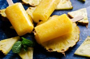 A close up of some pineapple slices on a plate
