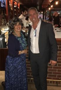 A man and woman posing for the camera.