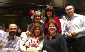 A group of people posing for the camera.