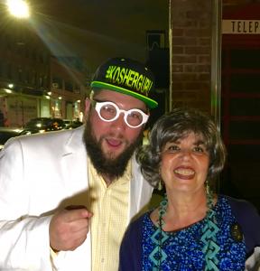 A man and woman posing for the camera.