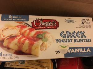 A box of frozen food on the shelf.
