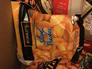 A bag of potato chips sitting on top of a counter.