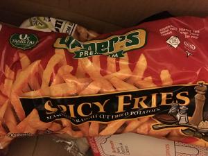 A close up of some bags of fries