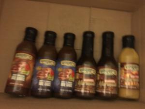 A shelf with many bottles of beer on it