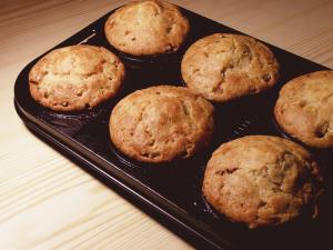 A tray of muffins on top of a table.