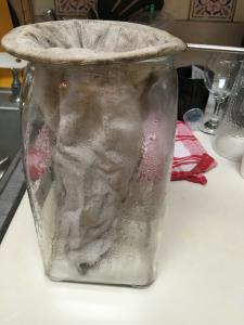 A clear plastic bag with some stuff inside of it