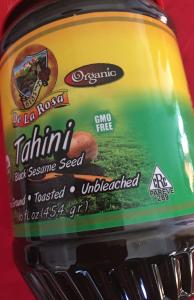A close up of the front cover of a tin