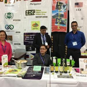 Philippine booth showcasing coconut oil bottles