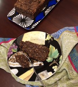 A bowl of cake and another plate with some cake.