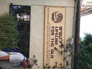 A wooden sign that says union league for the old.