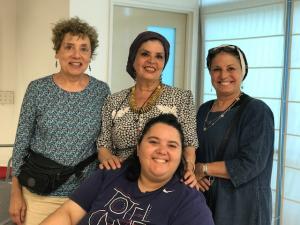 A group of people standing next to each other.