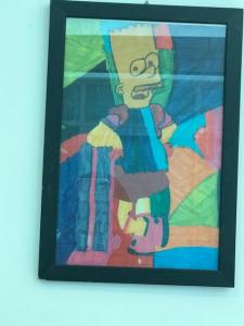 A painting of a person in a colorful outfit.