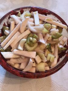 A bowl of food with some kind of vegetables