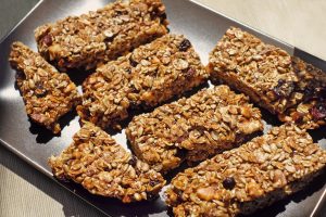 A close up of some granola bars on a plate