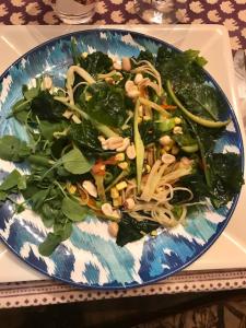 A plate of food that is on the table.