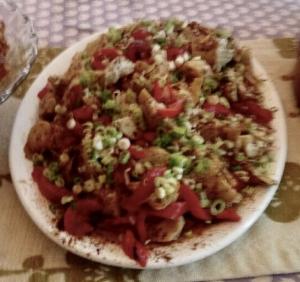 Loaded nachos with red peppers and scallions