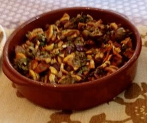 A bowl of food on the table