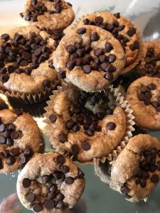 A close up of some chocolate chip muffins