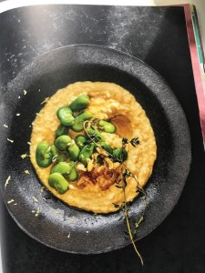 A bowl of food on top of a table.