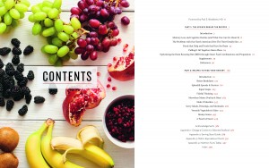 A table topped with fruit and some writing.