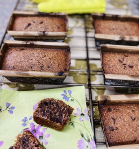 A bunch of brownies sitting on top of a rack.