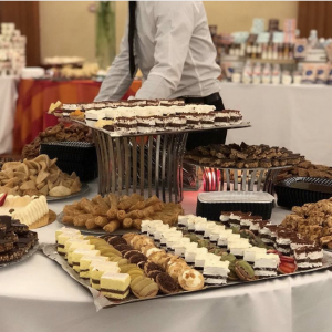 A table with many different types of desserts.