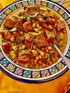Hearty chickpea and vegetable stew in patterned bowl